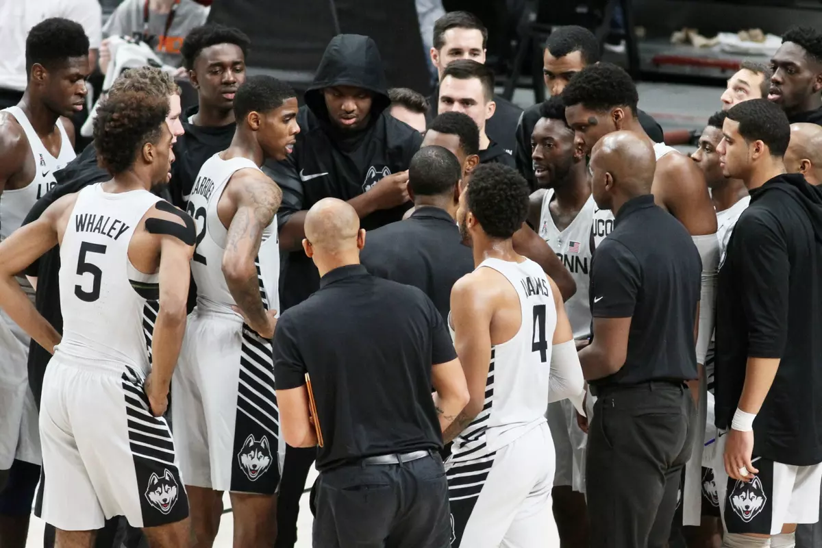 UConn huddle vs. Arkansas on Sunday (PC: RIck Morgan).