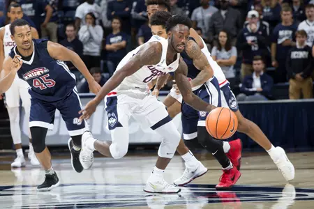 Antwoine Anderson makes a steal against Queens College (PC: Steve Slade).