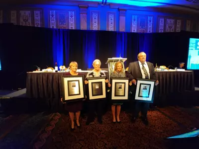 Mullins (second from left) with the 2017 NFCA Hall of Fame Class.
