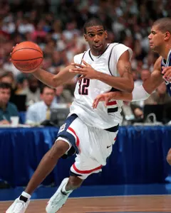 A two-time All-American, Rip Hamilton is the second-leading scorer in UConn history (2,036 points) and led the Huskies to their first NCAA Championship..