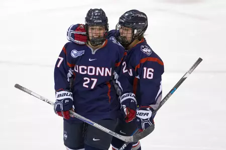 Morgan and Taylor Wabick, twin sisters, celebrate Morgan's first period goal (PC: Steve Slade).