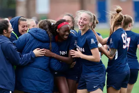 Yamilee Eveillard celebrates a goal with the team against Houston