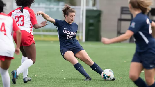 Kara Long kicks the ball vs. Houston