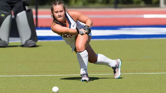 Kourtney Kennedy passes the ball.