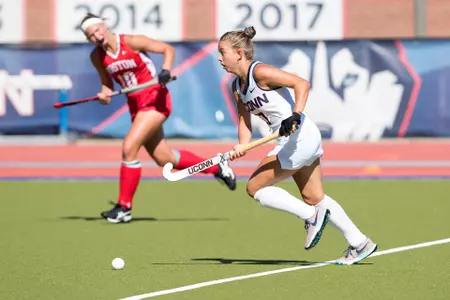 Olivia Clarke runs with the ball vs. BU.