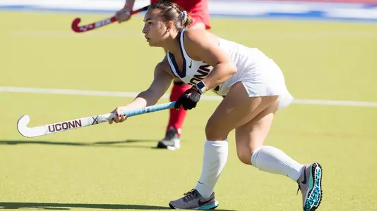 Liz Romano passes the ball.