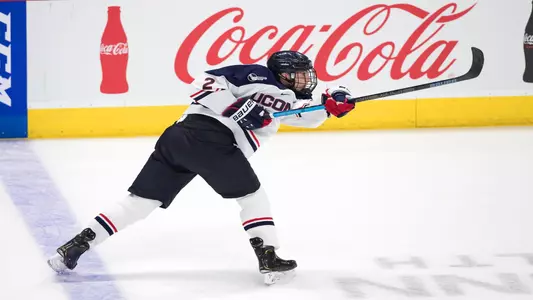Yan Kuznetsov shoots the puck in a game against RPI