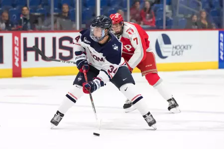 Ruslan Iskhakov looks to pass in a game against RPI