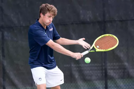 John Michael Holtmann hits a backhand