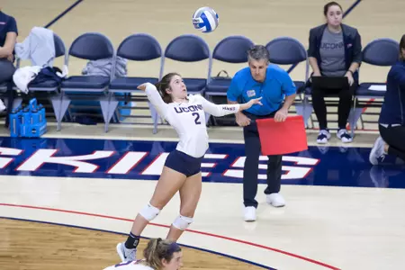 Mia Ruffolo hits a serve