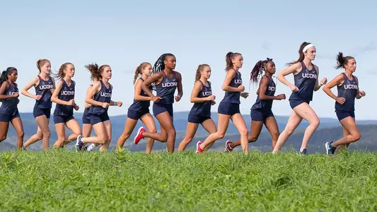 Women's Cross Country team running