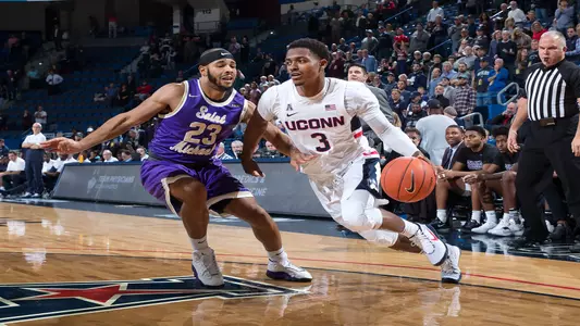 Alterique Gilbert drives to the hoop against St. Michael's