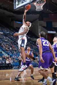 Brendan Adams goes for a layup against St. Michael's