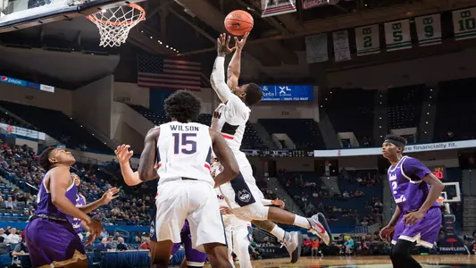 Alterique Gilbert goes up for a layup against St. Michael's