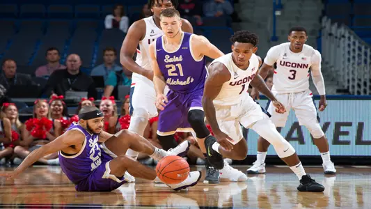 Christian Vital fights for a loose ball against St. Michael's