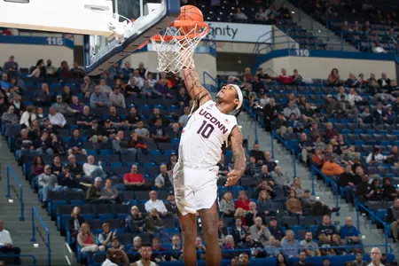 Brendan Adams dunks against St. Michael's