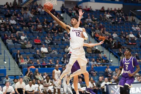 Tyler Polley lays the ball up against St. Michael's
