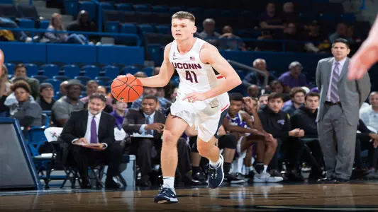 Matt Garry takes the ball up the court against St. Michael's