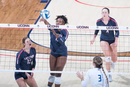 Kennadie Jake-Turner spikes the ball against Tulsa