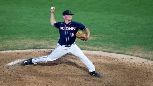 Jacob Wallace pitching in a game against OSU