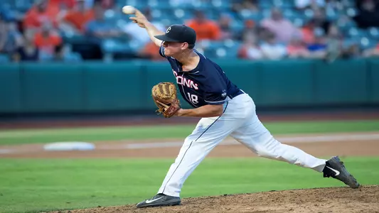 Jacob Wallace pitching in a game against OSU