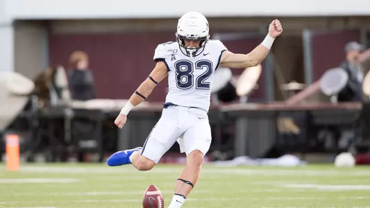 Mason Donaldson kicks off against UMass on October 26.