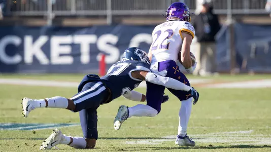 Omar Fortt wraps up an ECU runner on November 23