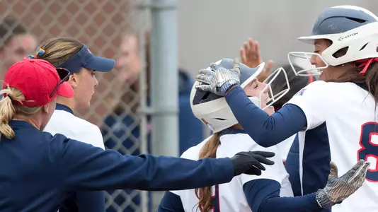 team celebration at home plate