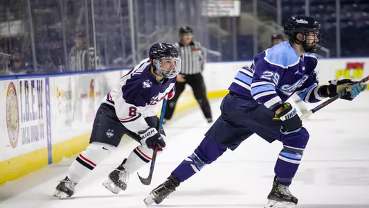 Carter Turnbull looks for the puck against Maine