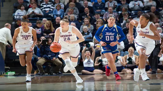 Anna Makurat drives up the court in a game versus Tulsa.