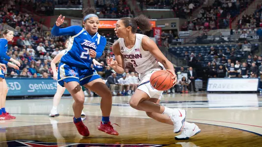 Megan Walker drives in a game against Tulsa