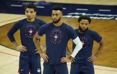 James Bouknight, Tyler Polley and RJ Cole during pregame warmups on November 25, 2020.
