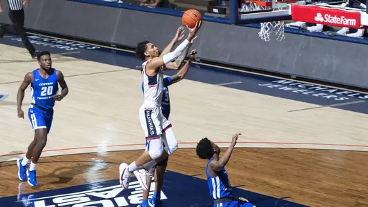 James Bouknight takes it to the rim in the Huskies' win over CCSU on November 25.