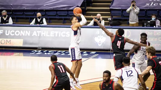 Tyrese Martin takes a jump shot at the top of the key against Hartford on November 27.