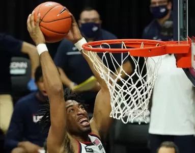 Isaiah Whaley slams it home against Hartford on November 27.