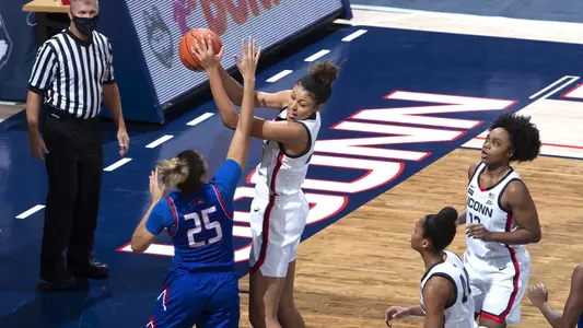 Olivia Nelson-Ododa pulls down a rebound against UMass-Lowell on December 12, 2020.