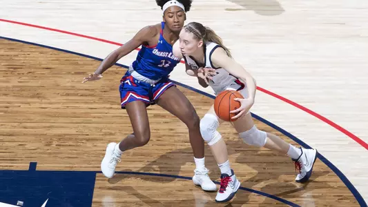 Paige Bueckers drives past a UMass-Lowell defender on December 12, 2020.