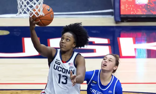 Christyn Williams drives to the hoop against Creighton on December 17, 2020.