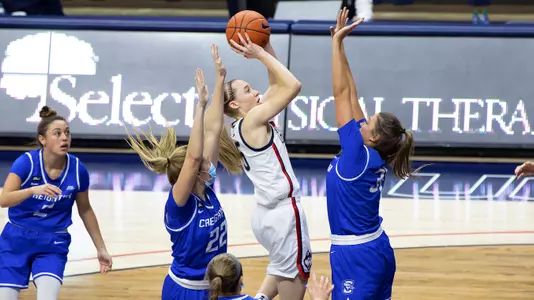 Paige Bueckers pulls up in traffic against Creighton on December 17, 2020.