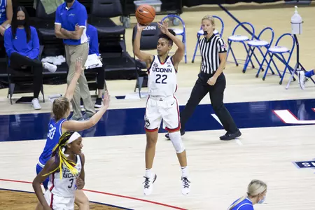 Evina Westbrook shoots a three-pointer against Creighton on December 17, 2020.