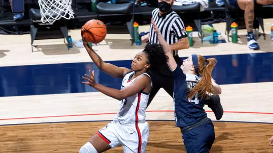 Christyn Williams drives to the hoop against Xavier on December 19, 2020.