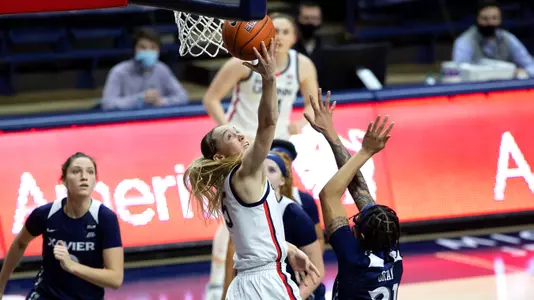 Paige Bueckers converts on a reverse lay up against Xavier on December 19, 2020.