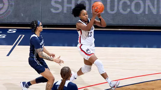 Christyn Williams looks to dish to a teammate in transition against Xavier on December 19, 2020.