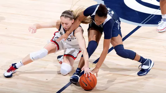 Paige Bueckers dives on a loose ball against Xavier on December 19, 2020.