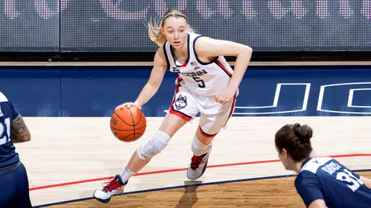 Paige Bueckers dribbles on the wing against Xavier on December 19, 2020.