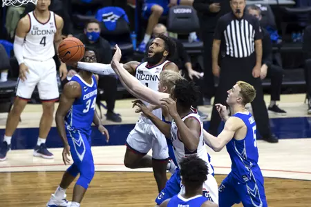 Rj Cole drives through the defense for the basket in the game against Creighton on December 20th 2020