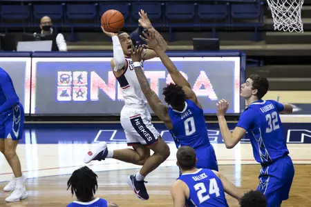 Tyrese Martin rises over the defender as he drives to the basket in the game against Creighton on December 20th 2020