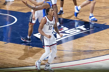 Brendan Adams celebrates after drawing a charge in the game against Creighton on December 20th 2020