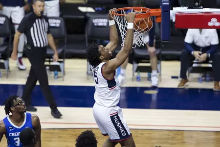 Isaiah Whaley slams home the dunk in the game against Creighton on December 20th 2020
