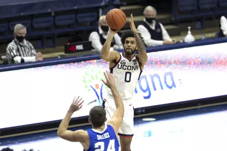 Jalen Gaffney rises and takes the shot over the defender in the game against Creighton on December 20th 2020